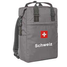 Load image into Gallery viewer, Trage Rucksack in Grau mit Schweizerkreuz und Text Schweiz
